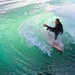 Surfer inside the wave curl:  tighter crop by jyokota