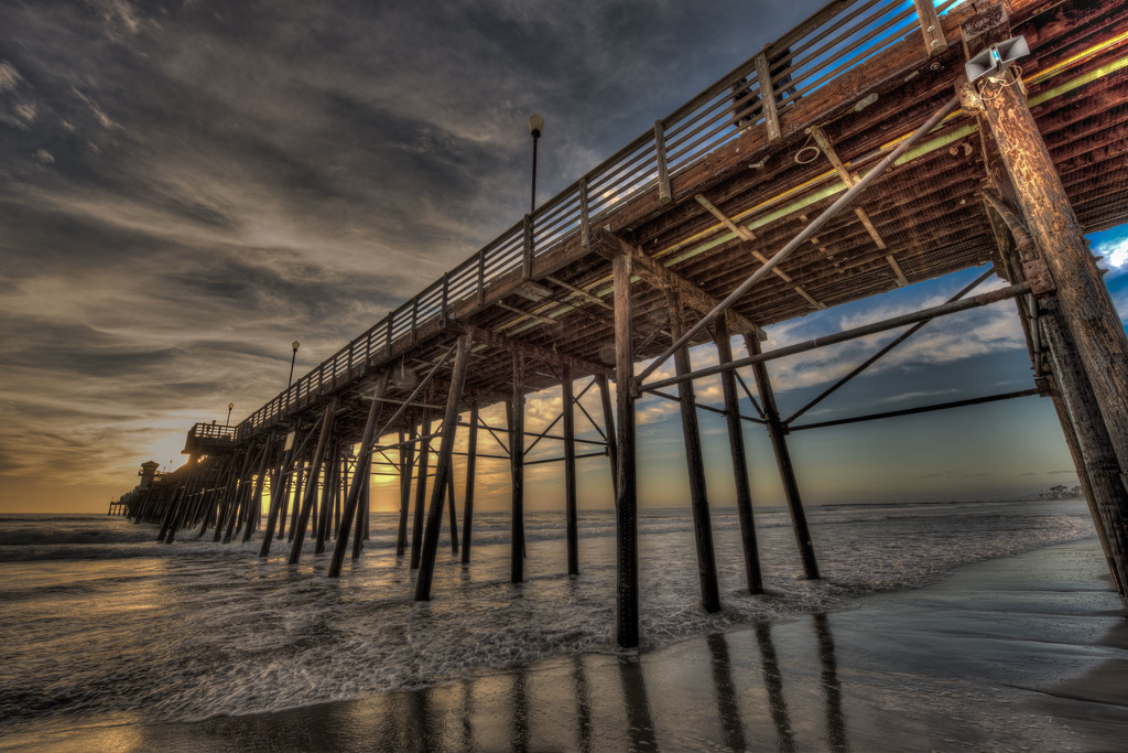 Sun Sets at the End of the Pier by taffy