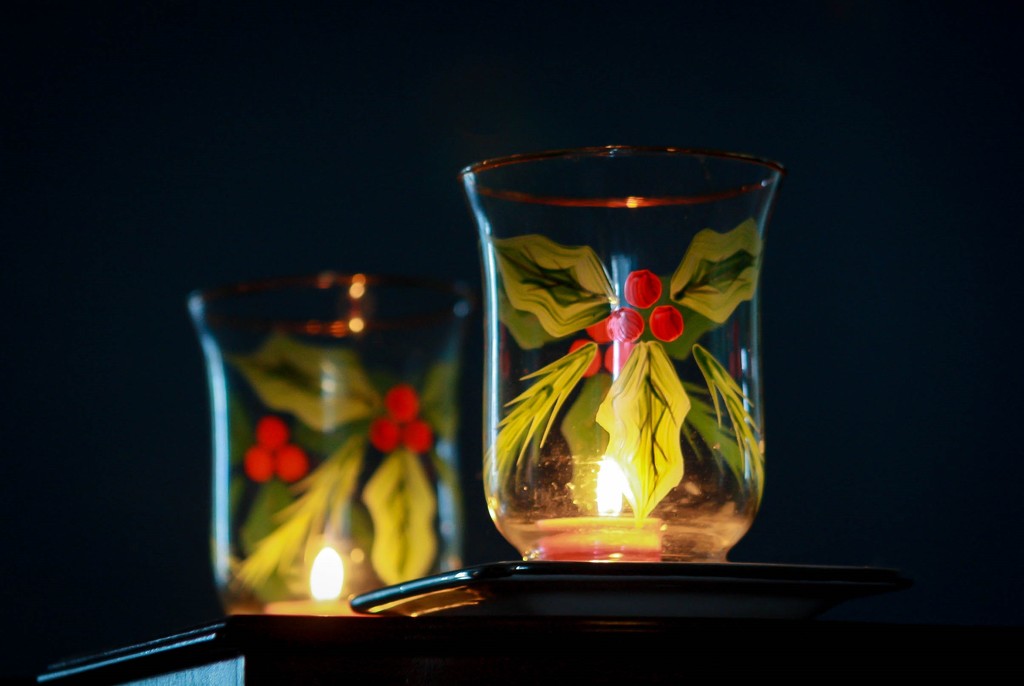 Candle reflection by mittens