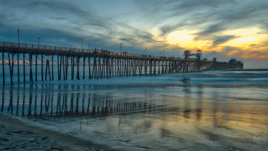 Ghost Surfers at Oceanside Pier  by taffy