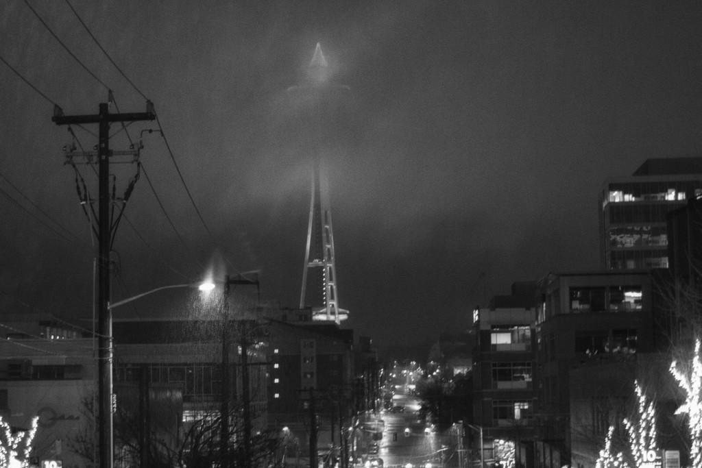 A Rainy and  Foggy Night In Seattle. The Lighted Christmas Tree On the Needle Is The Beacon To Find My Way Home. by seattle