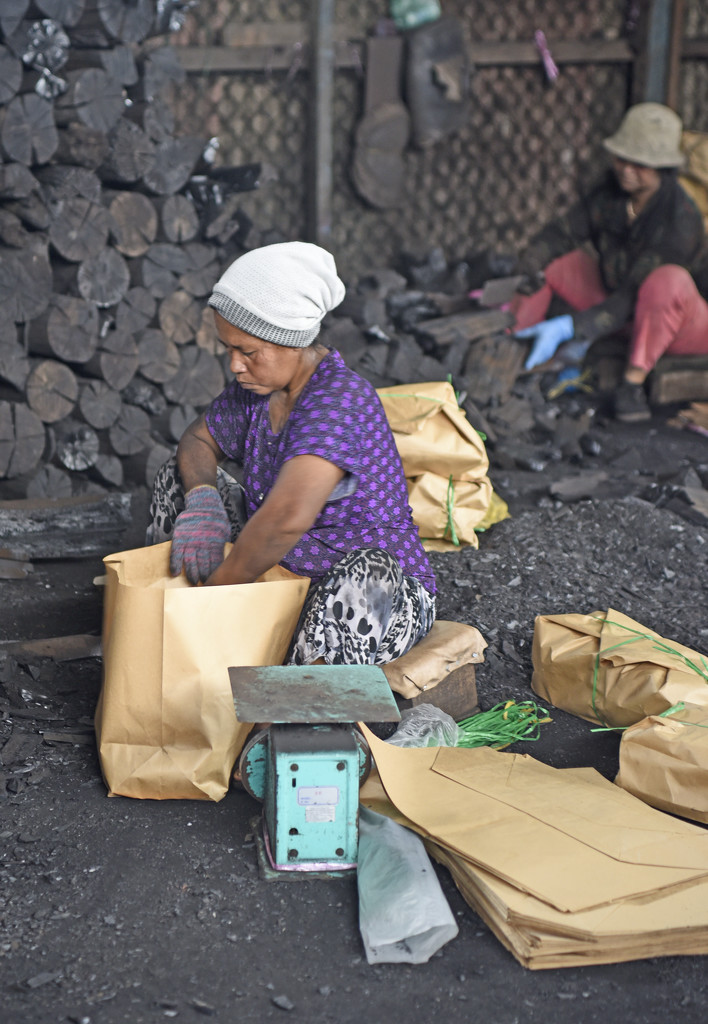 Hand packing charcoal by ianjb21