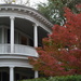 Historic house and Japanese maple in full color by congaree