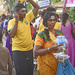 Thaipusan pilgrims on way to temple with milk and offerings by ianjb21