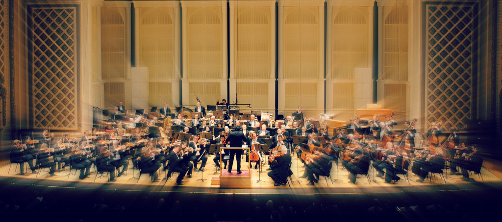 The Maestro Conducting the Final Crescendo by alophoto