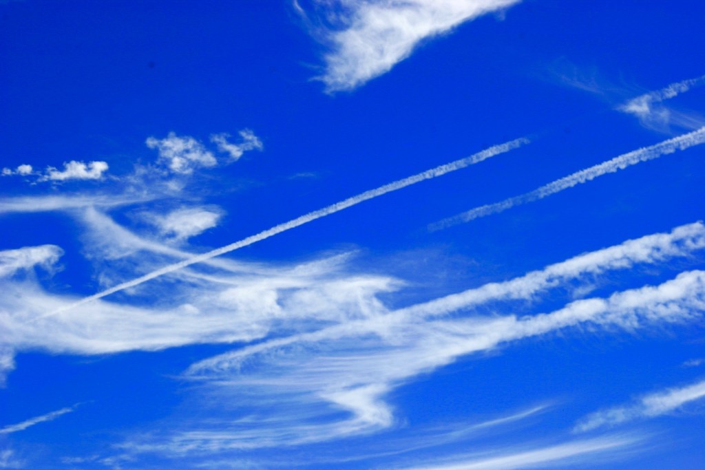 contrails and blue sky by scottmurr