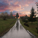 Wet road and sunset by teiko