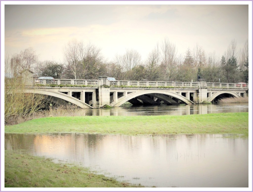 Atcham bridge and the flooded field  by beryl