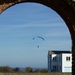 Incoming over the house and through the arch by padlock