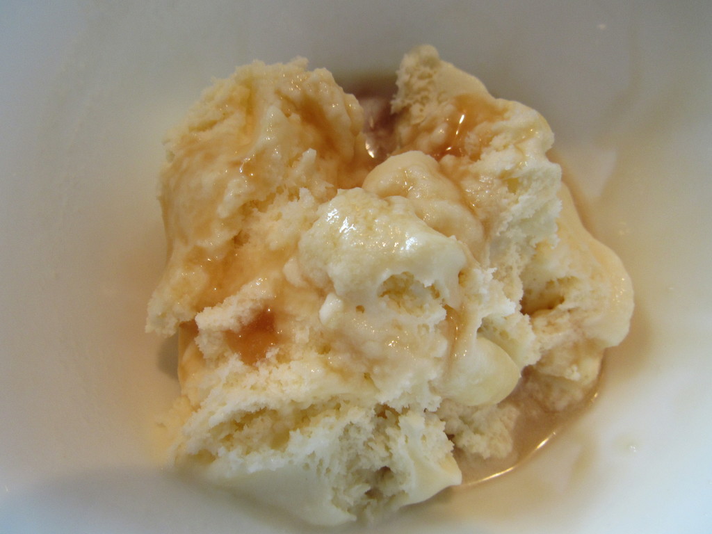 Ice cream topped with maple syrup by mlwd