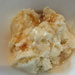 Ice cream topped with maple syrup by mlwd