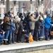 Crowds await a special arrival at York by fishers