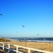 Kite surfing at Nobby's Beach by susiangelgirl