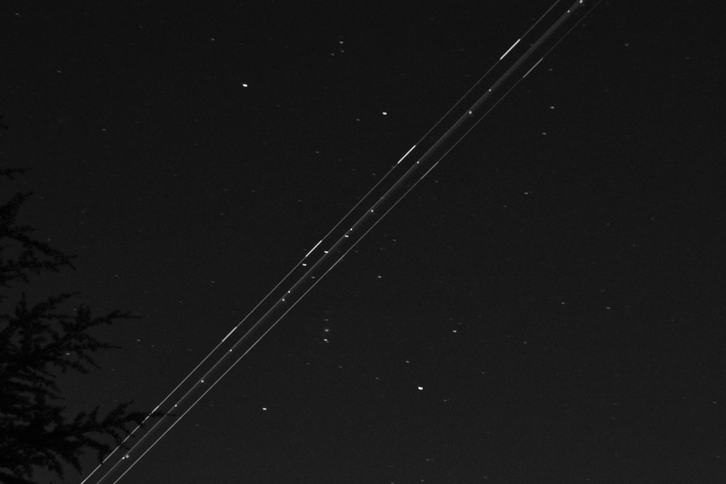 of stars and jet trails by summerfield