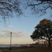 Waterfront Park overlooking Charleston Harbor, Charleston, SC.  In the far distance, across the harbor, is Fort Sumter, the tiny speck on the horizon. by congaree
