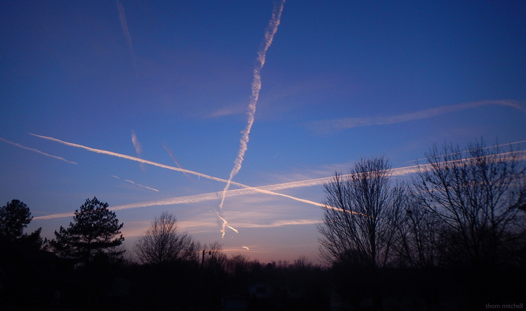 Jet trails at dusk  by rhoing