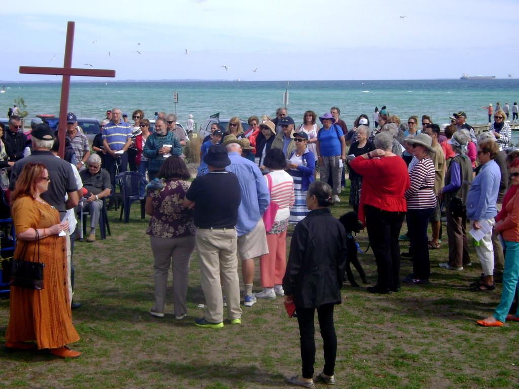 Gathering on foreshore for Good Friday by marguerita