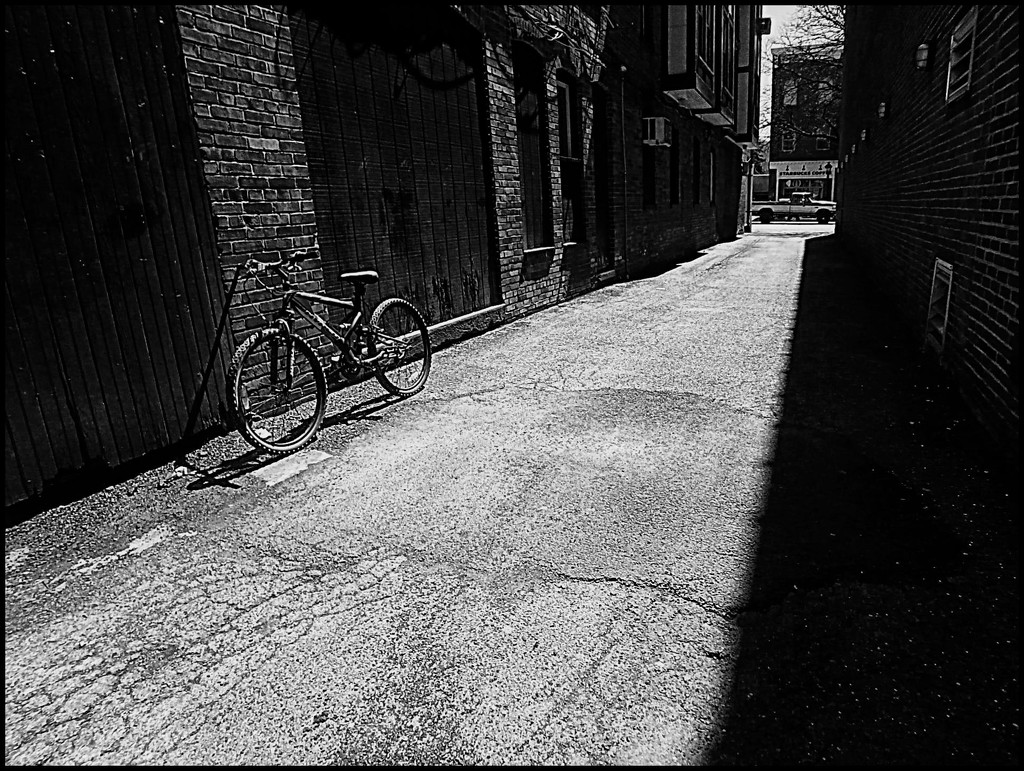 Bicycle in the Alleyway by olivetreeann