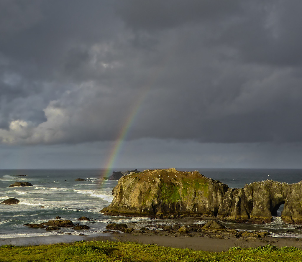 Morning Rainbow At Bandon Rocks by jgpittenger