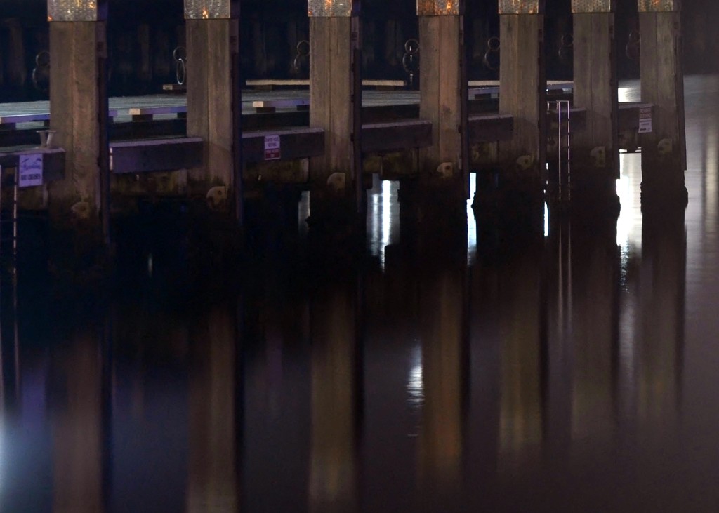 bollard reflections at night by dianeburns