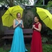 two girls with yellow umbrellas  by wiesnerbeth