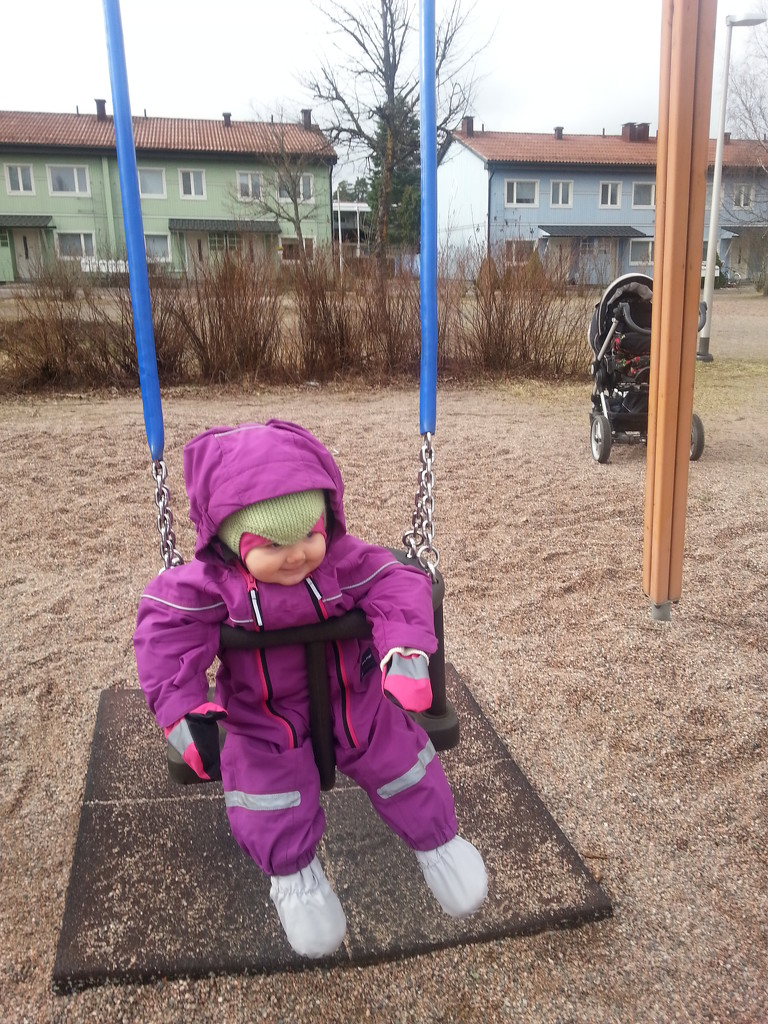 Granddaughter swinging by annelis
