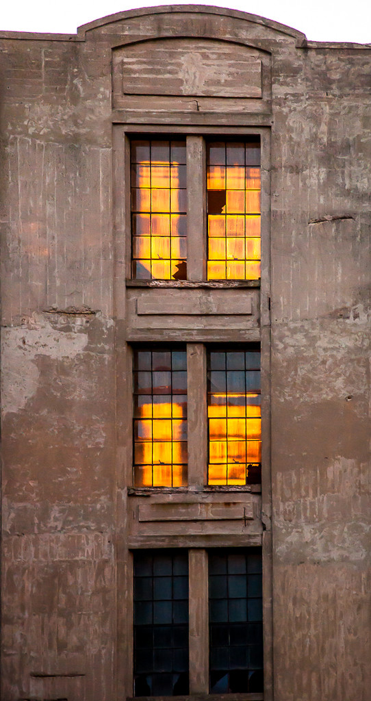 Beautiful light shining through the old mill windows by joansmor