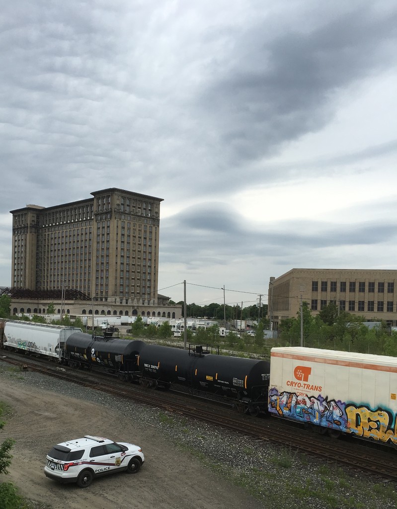 Freight train coming out of the tunnel under the river.  by corktownmum