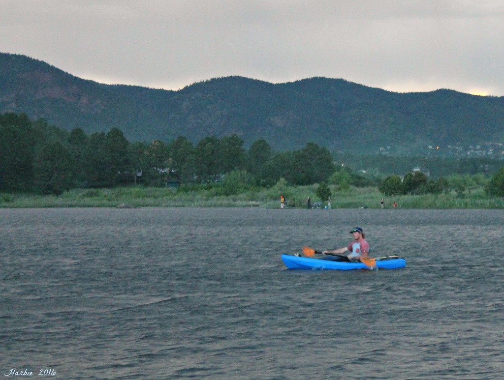 Kayaker at Dusk by harbie
