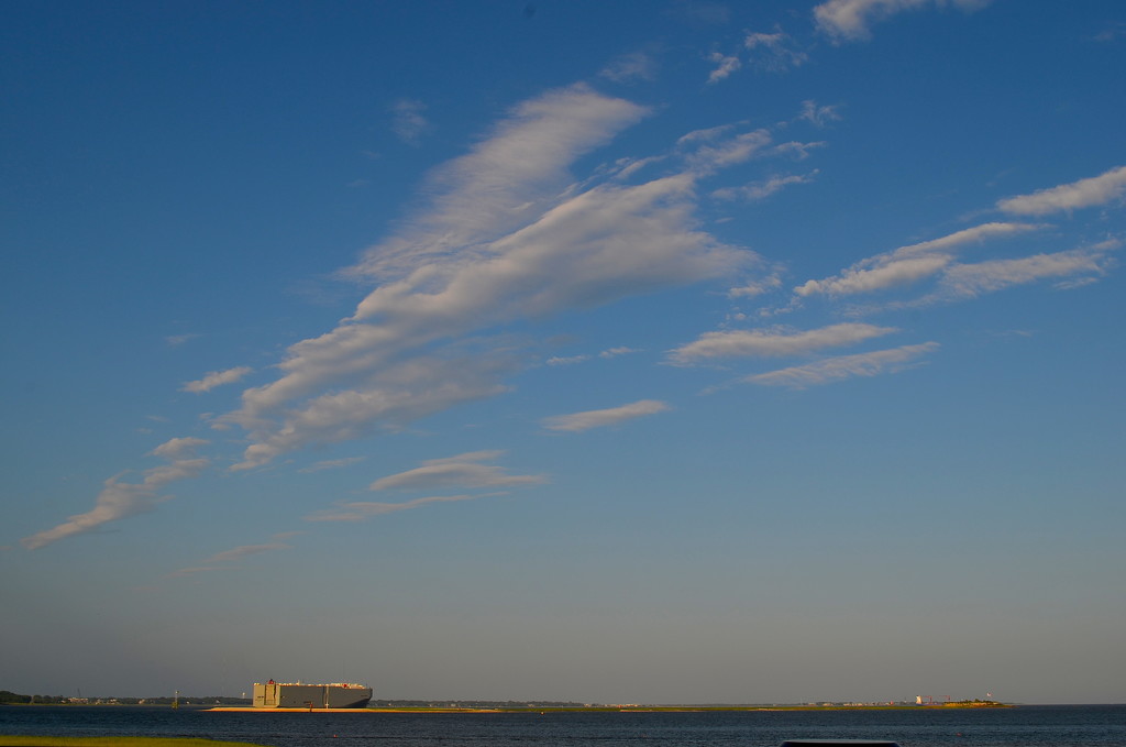 Cargo container ship heading out to sea from the Port of Charleston, SC by congaree