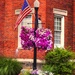 Flag waving in small town America by ggshearron