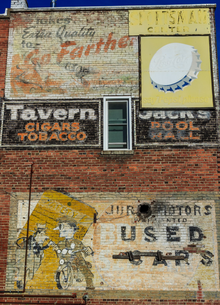 Signs on Cle Elum Brick Wall by clay88
