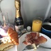 Champagne breakfast on the plane  by bizziebeeme