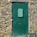 Green door by mittens