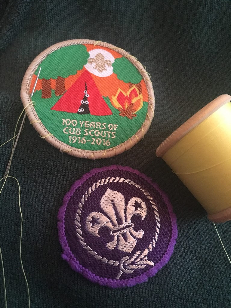 Sewing on Cubs Badges by cookingkaren