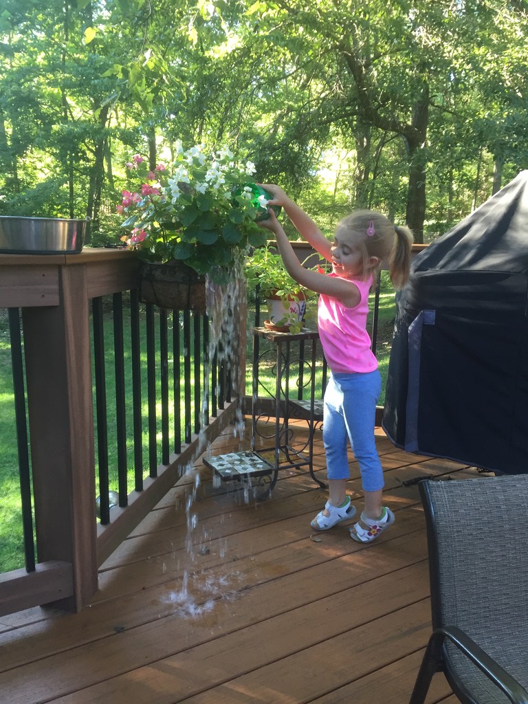 Watering Grandma's flowers by mdoelger