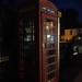 Red phone box in the village by denidouble