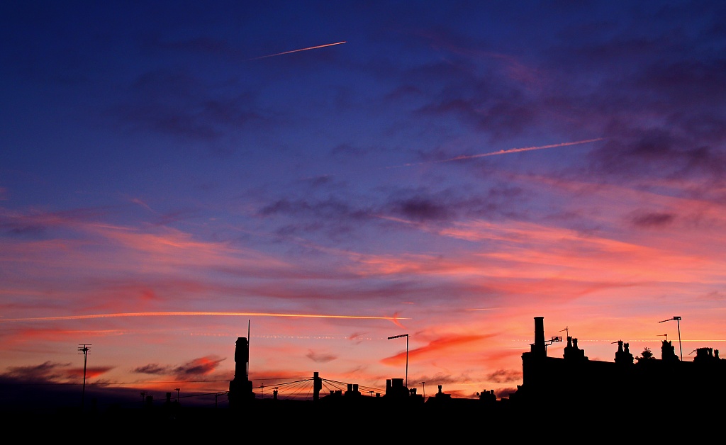 Sunset over Rooftops by rich57