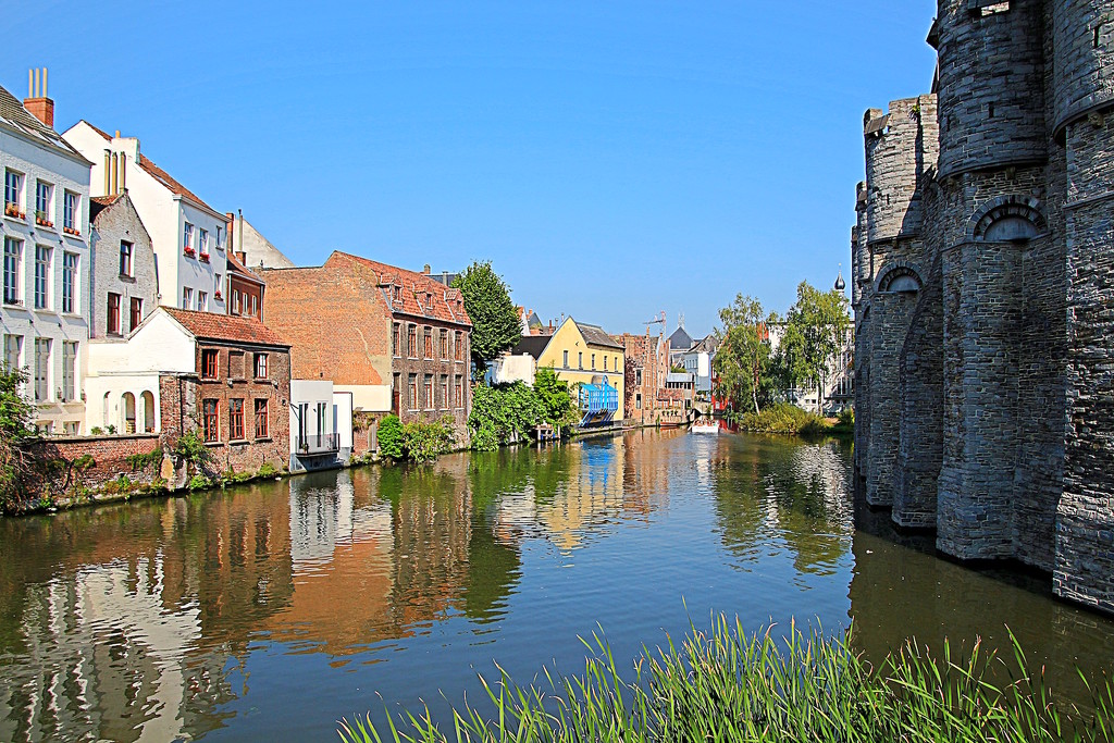 A canal and a castle in Gent by kiwinanna