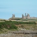 Dunstanburgh castle from Caster, Northumberland by cpw