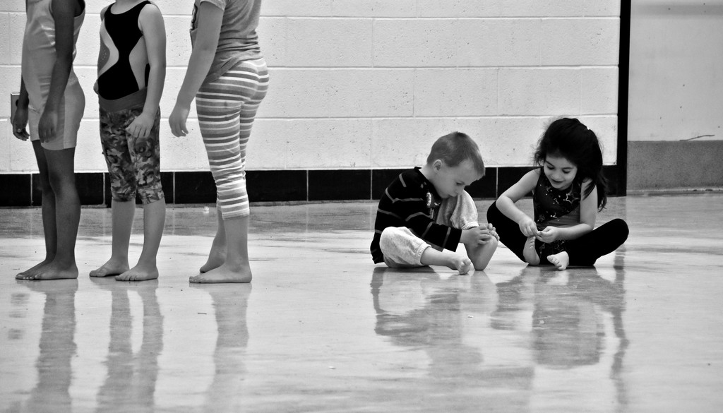 Paying attention at a Gymnastics class.... sort of :)  by vera365