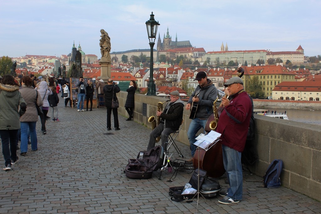 Musicians on the Charles Bridge in Prague by lucien