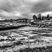 Tide out on winter harbour by frequentframes