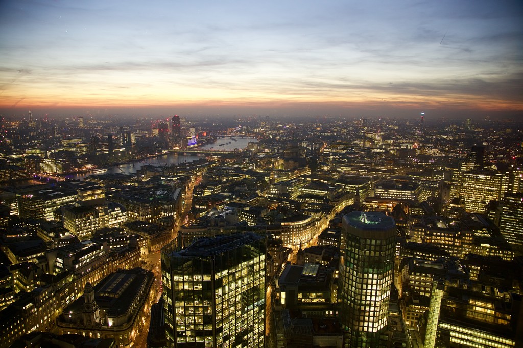 London Skyline at Lighting up time-best on black by padlock