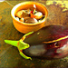 Eggplant on a Stone Table by olivetreeann