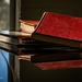 Books Reflected on Piano by jae_at_wits_end