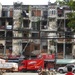 Cambodia: White building apartments  by helenhall