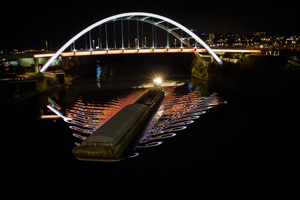 Boat Passing Under Bridge by jyokota