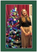 24th Dec 2016 - Maria with the Christmas tree she decorated.