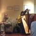 Harpist in the hospital waiting room by margonaut